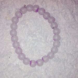 Purple and white bracelet